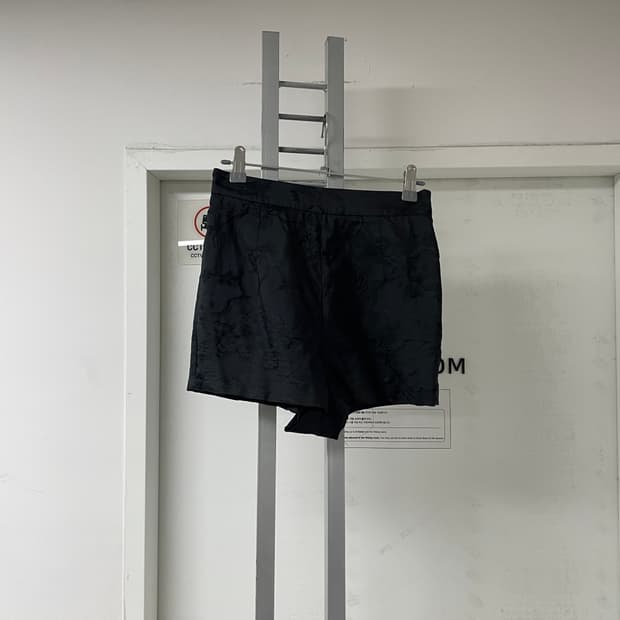 모스키노 블랙 플라워 패턴 반바지 38(W)