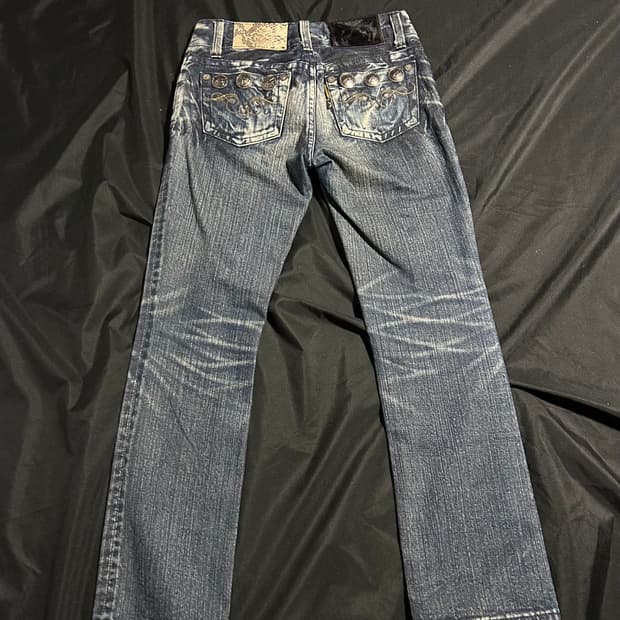 roar guns buttons denim jeans
