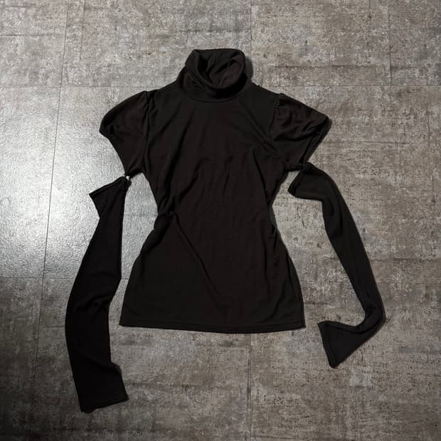 트랜스폼 슬리브 퍼프 폴라 넥 니트