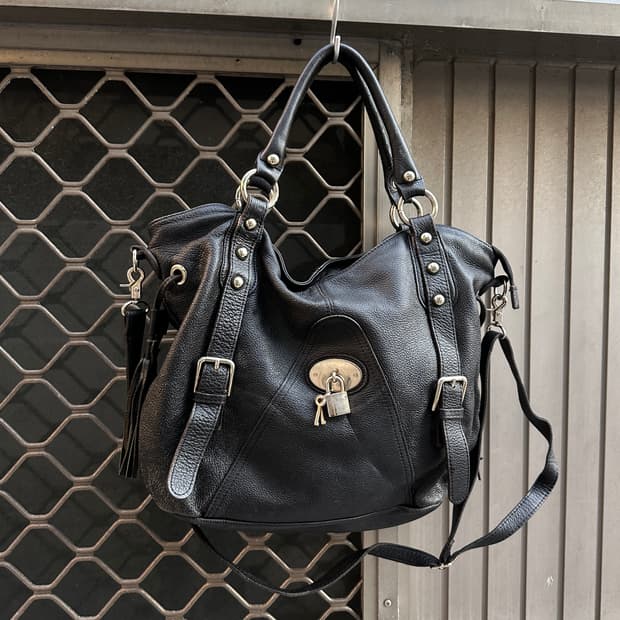 Tassel stud leather bag