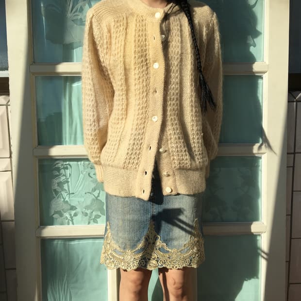 Punching pattern knit cardigan