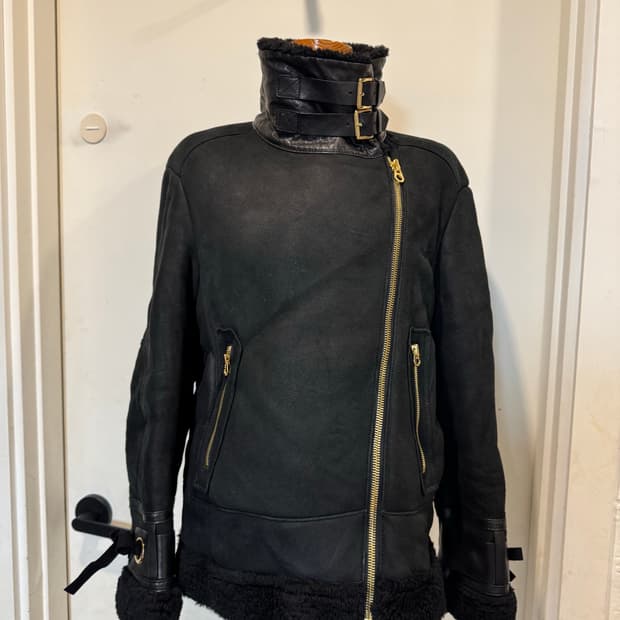 한섬 버드바이쥬시꾸뛰르 양 무스탕