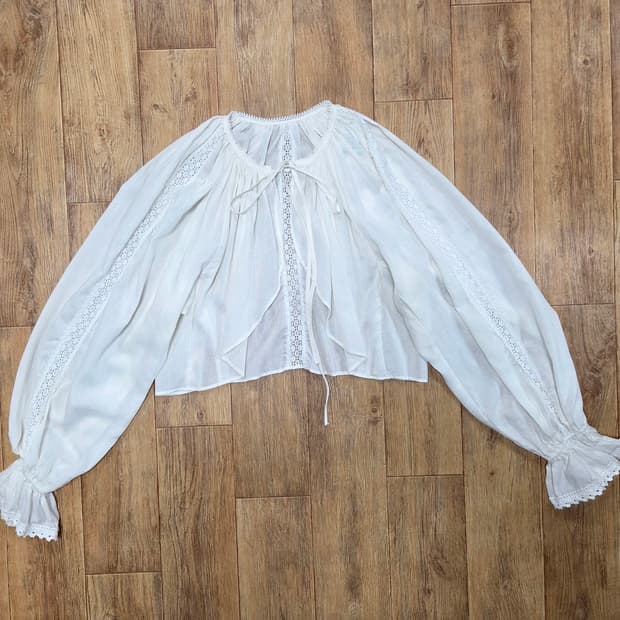 낸시렐라(nancyrella) 볼륨소매 가디건 프리사이즈