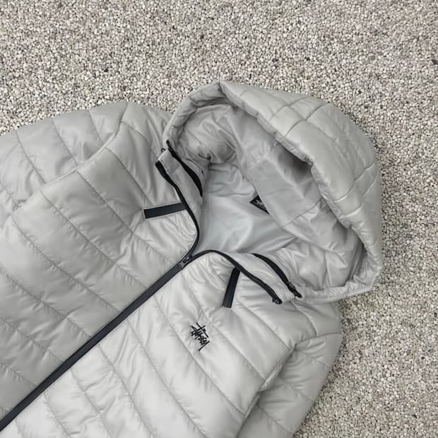 스투시 경량패딩