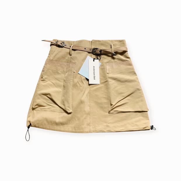 앤더슨벨 미카 아웃포켓 미니 스커트 베이지