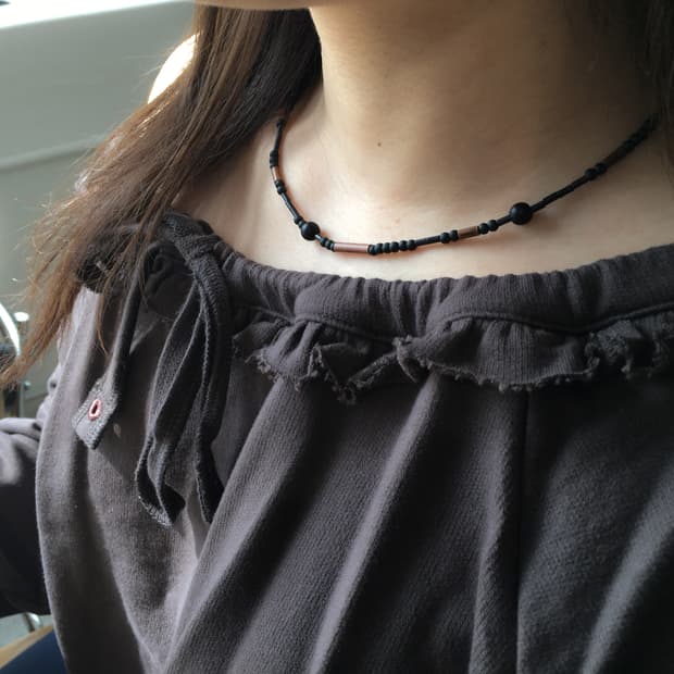 dark ball necklace