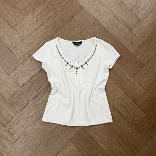 turquoise jewel tee