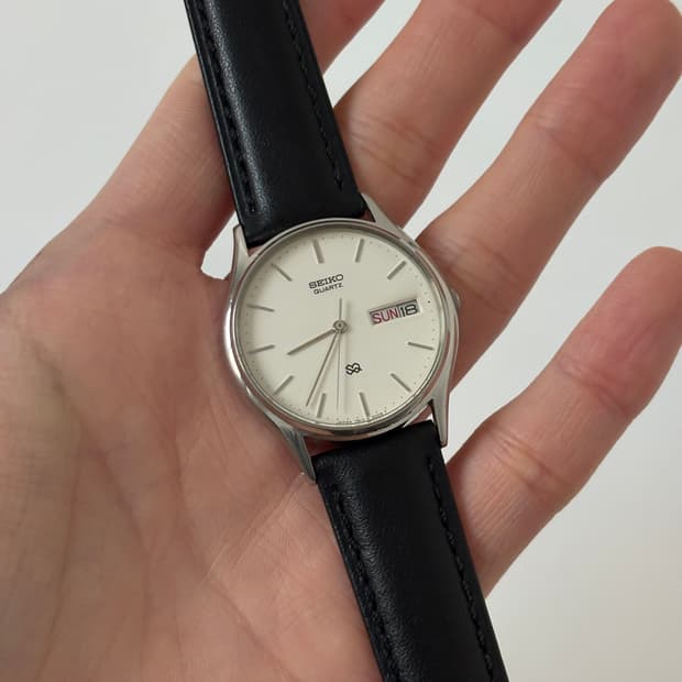 1980s SQ White Dial Silver Quartz