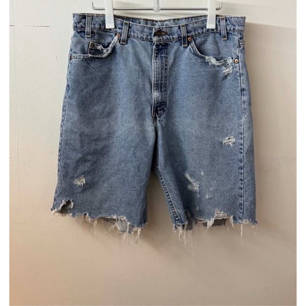 Levi's 550 Hem Destroyed Denim Shorts