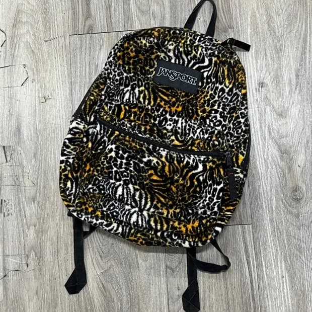 잔스포츠 레오파드 리버시블 양면 가방 백팩