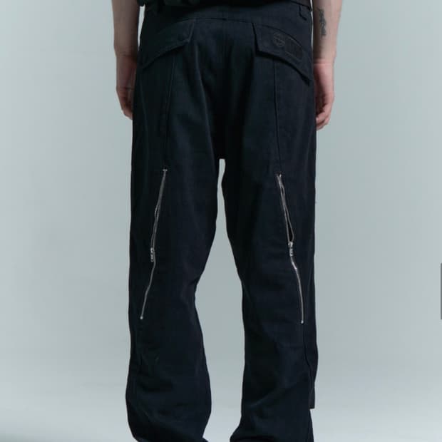 L[미착용보관오염있음)플라스틱프로덕트 MPa 웨이브 지퍼 팬츠 블랙 (보