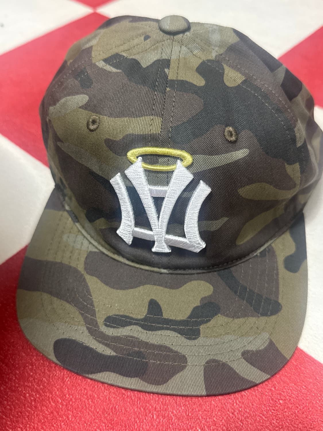 8月下旬お届けアイテム】AE SYMBOL ANGEL WING CAP [CAMO