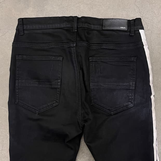 AMIRI SIDELINE CRUSH SKINNY JEANS | 후루츠패밀리